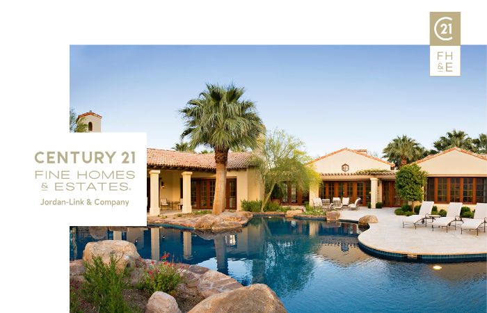 Spacious luxury villa with a Mediterranean style, palm trees, and a large swimming pool, labeled "CENTURY 21 Fine Homes & Estates, Jordan-Link & Company.